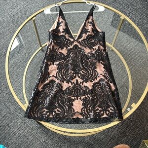 Brand new sequence, free people dress never been worn still has the tag on it.